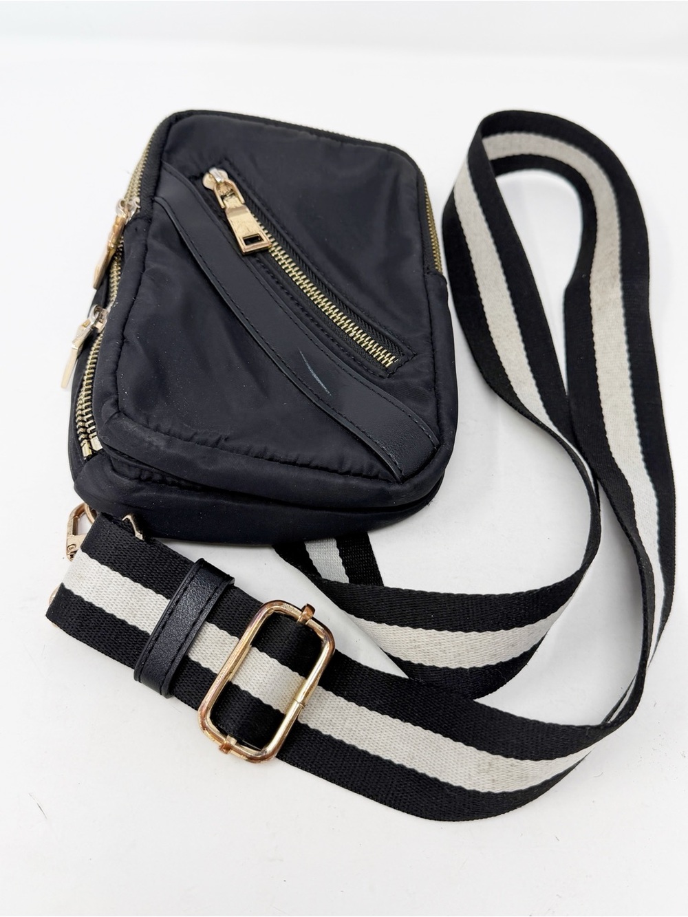 Sol and Selene Accolade Sling Bag Black Nylon Crossbody Gold Zip Stripe